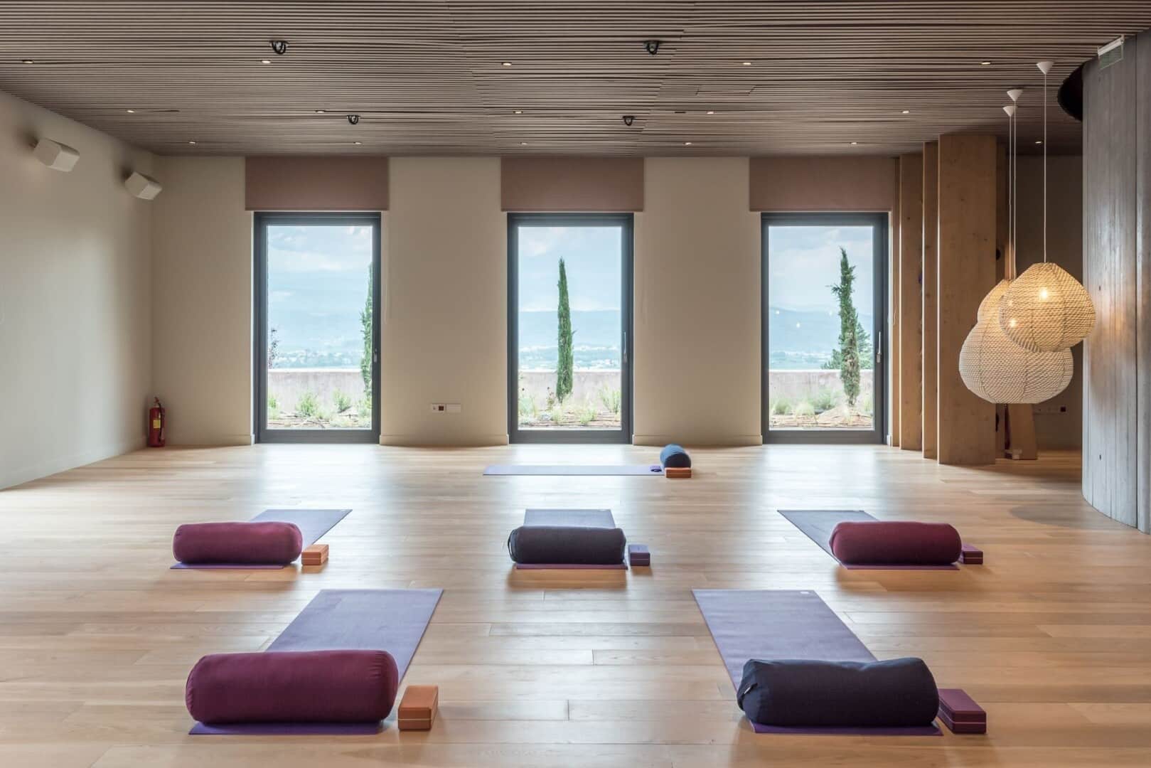 Calming rooms to practice focused relaxation during a yoga retreat in Greece at Euphoria.