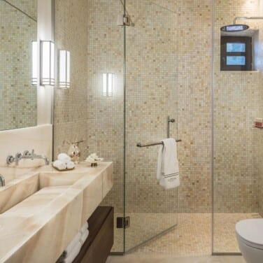 Executive Suite_Leoncini Mansion (the Heritage Building) Onyx Marble with Mosaics Shower